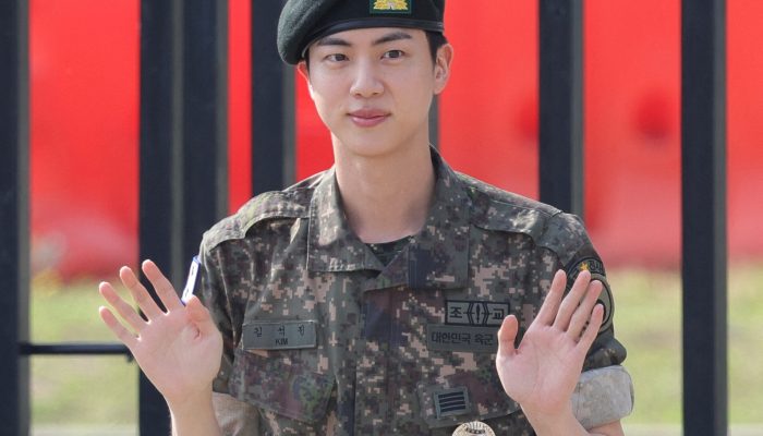 K-pop boy band BTS member Jin poses for photographs after being discharged from the military in Yeoncheon, South Korea, June 12, 2024.    Yonhap via REUTERS   THIS IMAGE HAS BEEN SUPPLIED BY A THIRD PARTY. NO RESALES. NO ARCHIVES. SOUTH KOREA OUT. NO COMMERCIAL OR EDITORIAL SALES IN SOUTH KOREA.